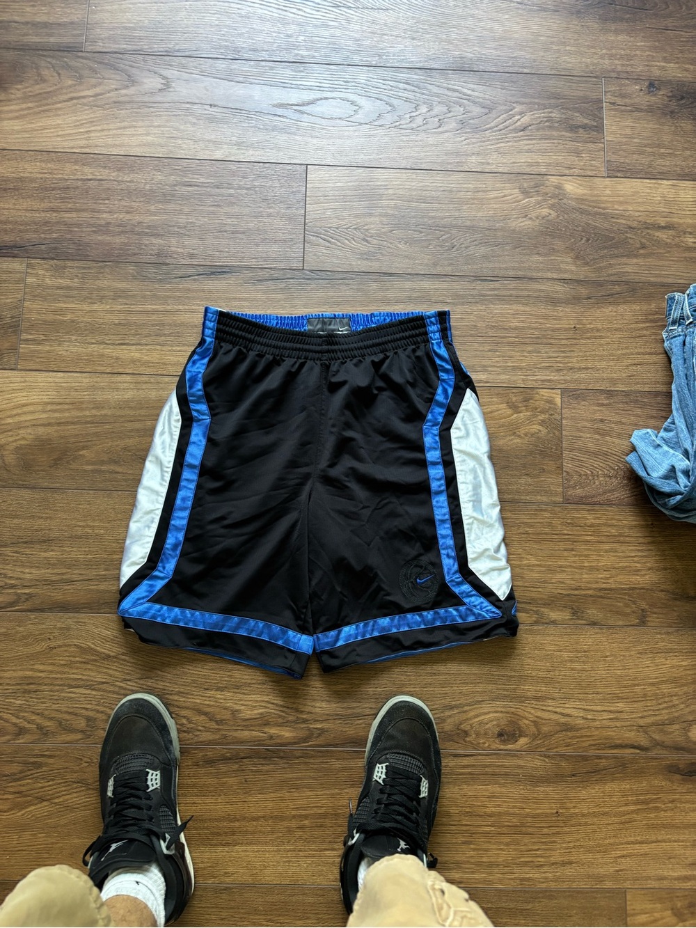 Nike Men’s Black Athletic Shorts with Blue Trim and White Panels